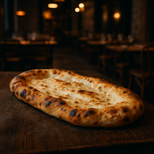 Freshly baked pinsa with a crispy crust.